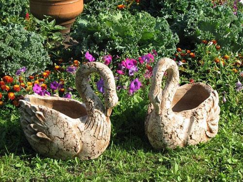 mini cama de flores en forma de pájaros